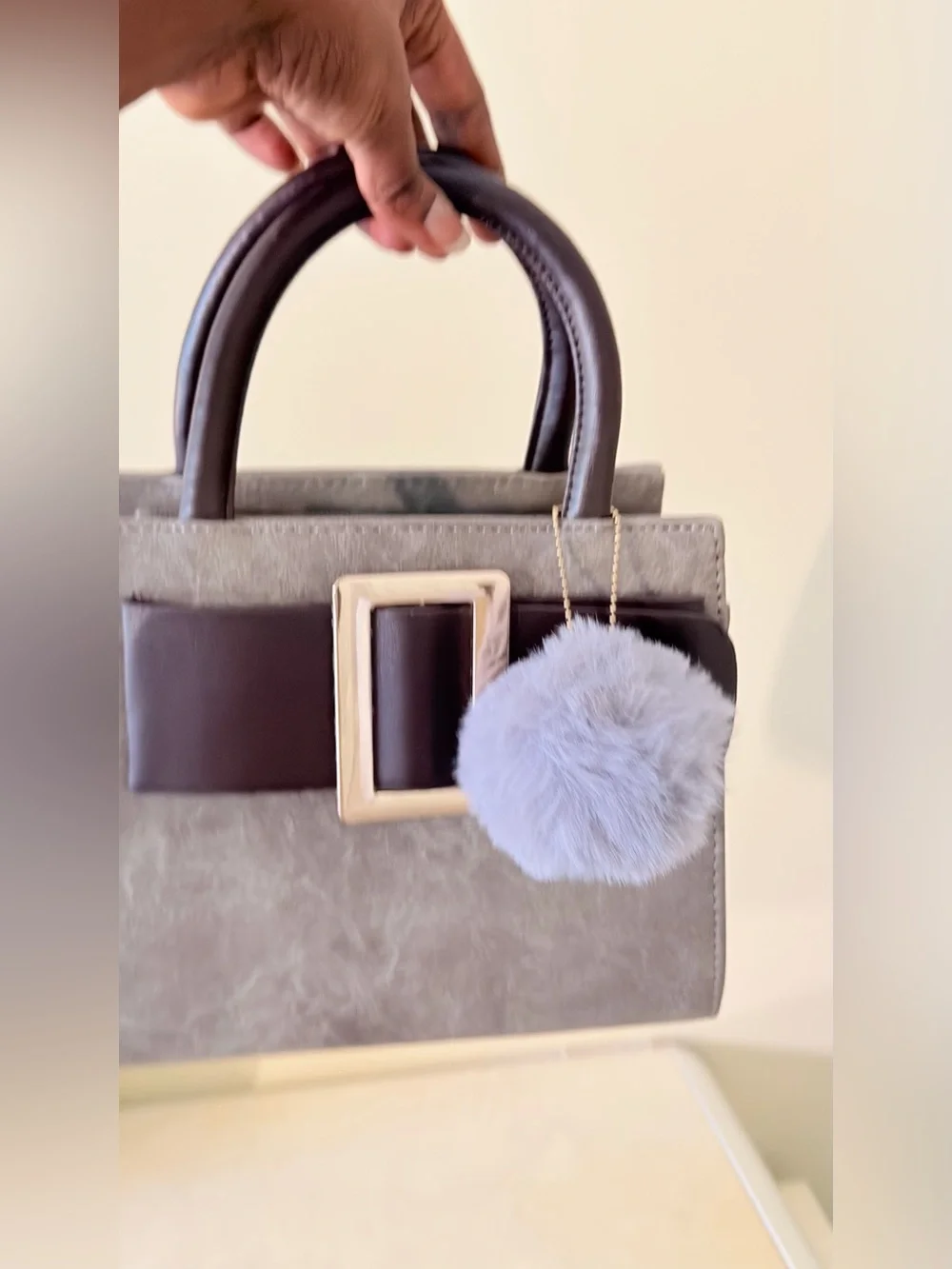Gray Suede Top-Handle Satchel with Pom Pom Charm